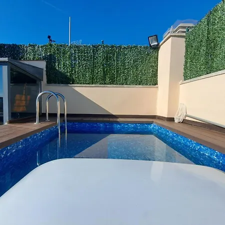 Апартаменты Atico Duplex Con Piscina Privada *