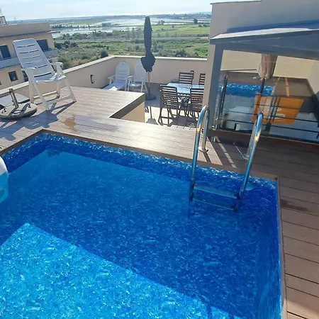 Апартаменты Atico Duplex Con Piscina Privada *